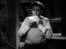 Young and Innocent (1937)Derrick De Marney and food